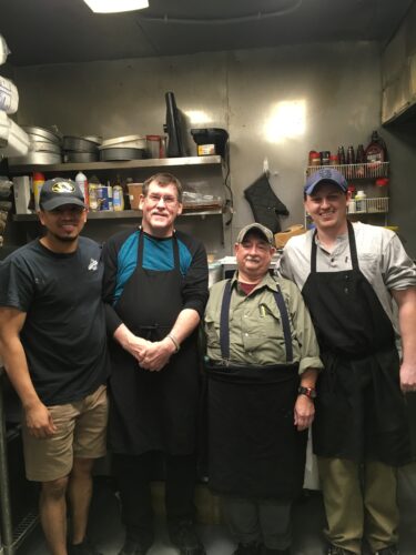Phil Graff and Steve Holbert with two coworkers in the Kitchen at Kehdes