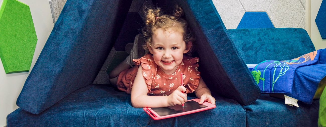 A young girl playing in the Mobile Sensory Accessibility Resource Center