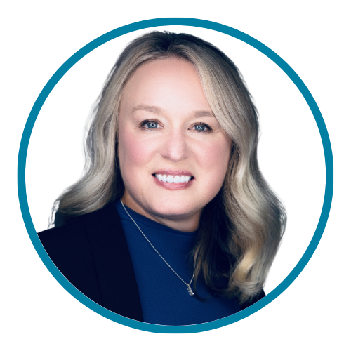 Untitled design (38) A women with blonde hair wearing a blue shirt and blazer