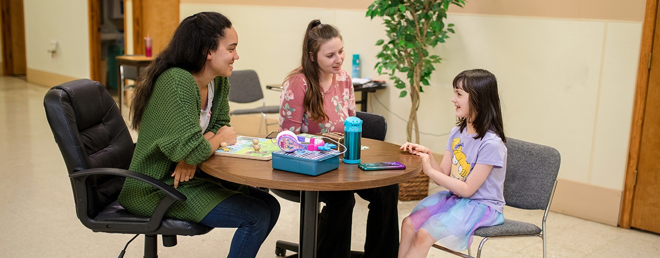 A clinical behavioral services therapist with a patient